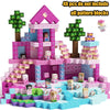 A set of pink and blue magnetic building blocks shaped like a castle, featuring various patterned pieces.