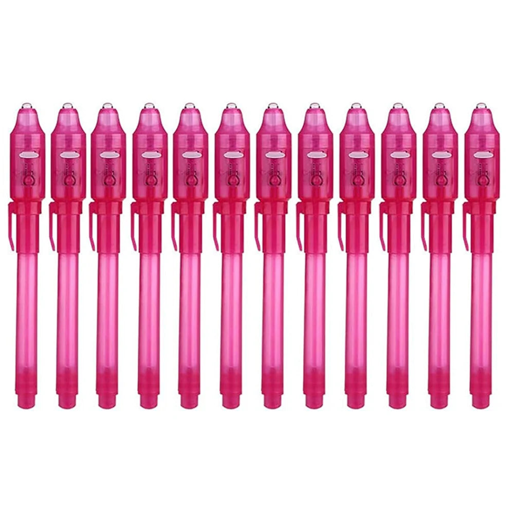 A set of pink invisible ink spy pens with UV light for secret messages