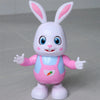 A white rabbit toy with pink accents and long ears, featuring a smiling face and outstretched paws.