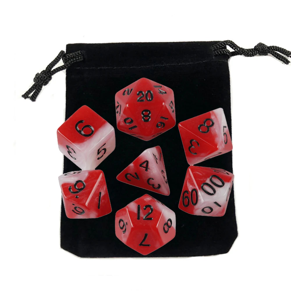 A set of red and white polyhedral dice stored in a black fabric bag.