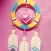 A necklace featuring a circular bead design with yellow, blue, and pink beads, suspended with three white feather-shaped pend