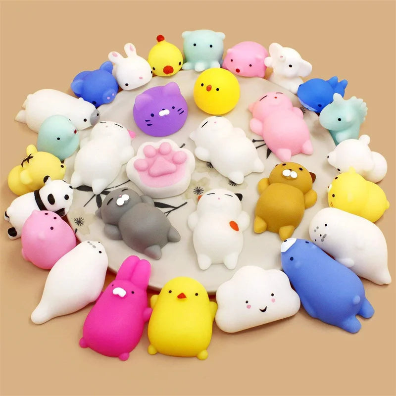 A collection of 50 squishy toys shaped like various cute animals in pastel colors arranged in a circle.