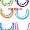 Four colorful striped U-shaped inflatable pool floats for adults in green, purple, orange, and blue.