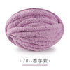 A ball of soft purple chenille yarn for hand knitting projects.