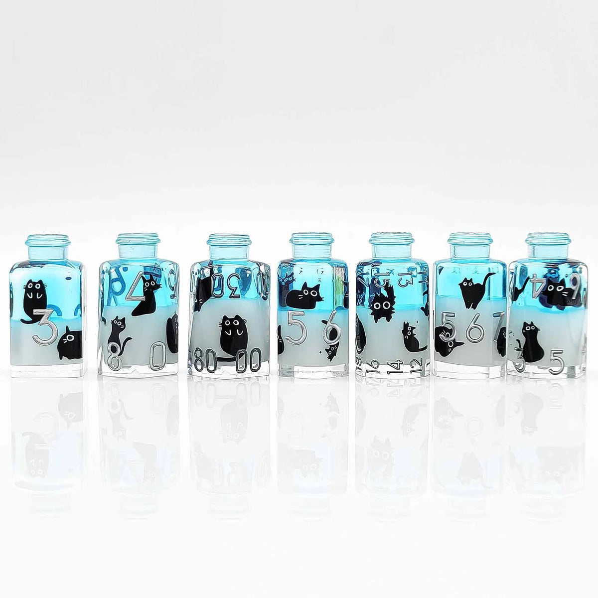 A set of seven floral resin potion bottles with numbers and cats, used as polyhedral dice.