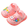 Pink lightweight children's clogs with yellow and blue decorations for summer fun