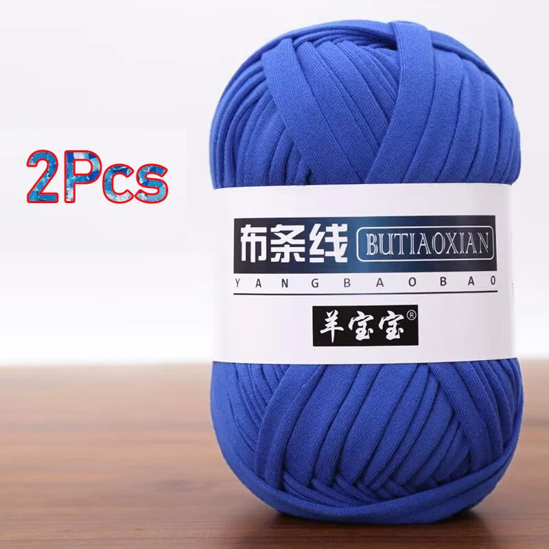 A skein of bright blue soft chunky t-shirt yarn labeled as Butiaoxian yarn for crochet and knitting, packaged as a 2-pack.