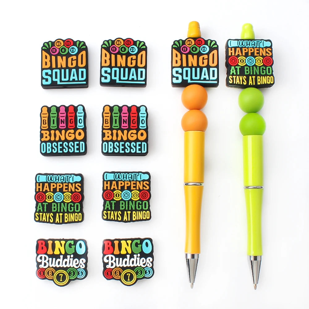 A set of colorful bingo-themed silicone beads and a yellow pen for DIY jewelry making