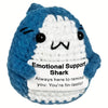 Handcrafted crochet shark doll with blue and white coloring.