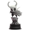 A handcrafted PVC collectible statue of the Hollow Knight Little Knight in a grey color.