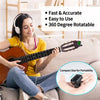 A woman plays a guitar while using a compact clip-on tuner for tuning.