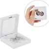 A white jewelry storage display box is shown open, with a hand holding a card displaying the initials SD.