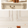 A set of cute capybara micro building blocks in various earthy and pink tones.