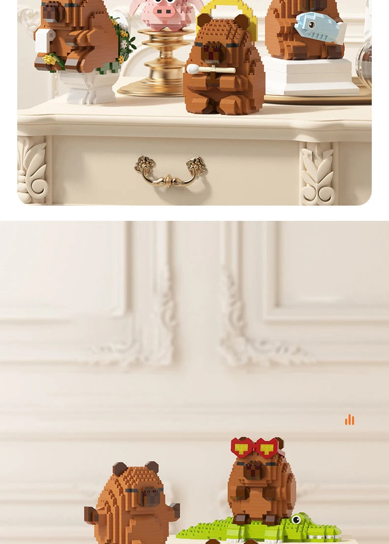 A set of cute capybara micro building blocks in various earthy and pink tones.