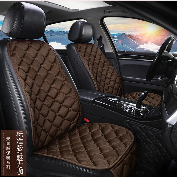 Interior view of a car seat showing three plush anti-slip cushions for winter warmth