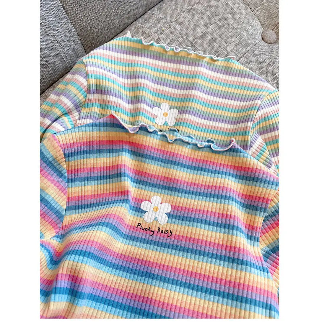 Girls striped floral print cotton t-shirt featuring pastel rainbow stripes and a white flower design