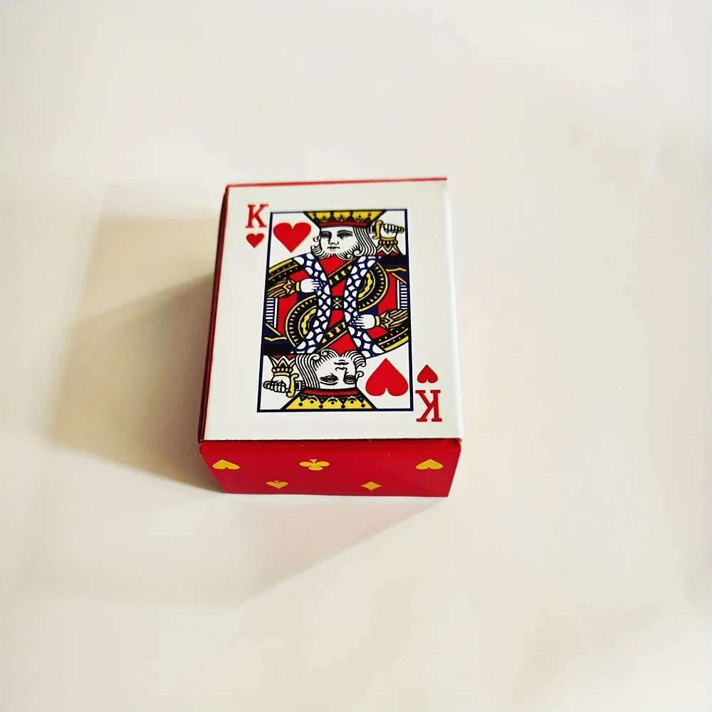 A red box containing a portable mini playing cards set featuring a King of Hearts design.