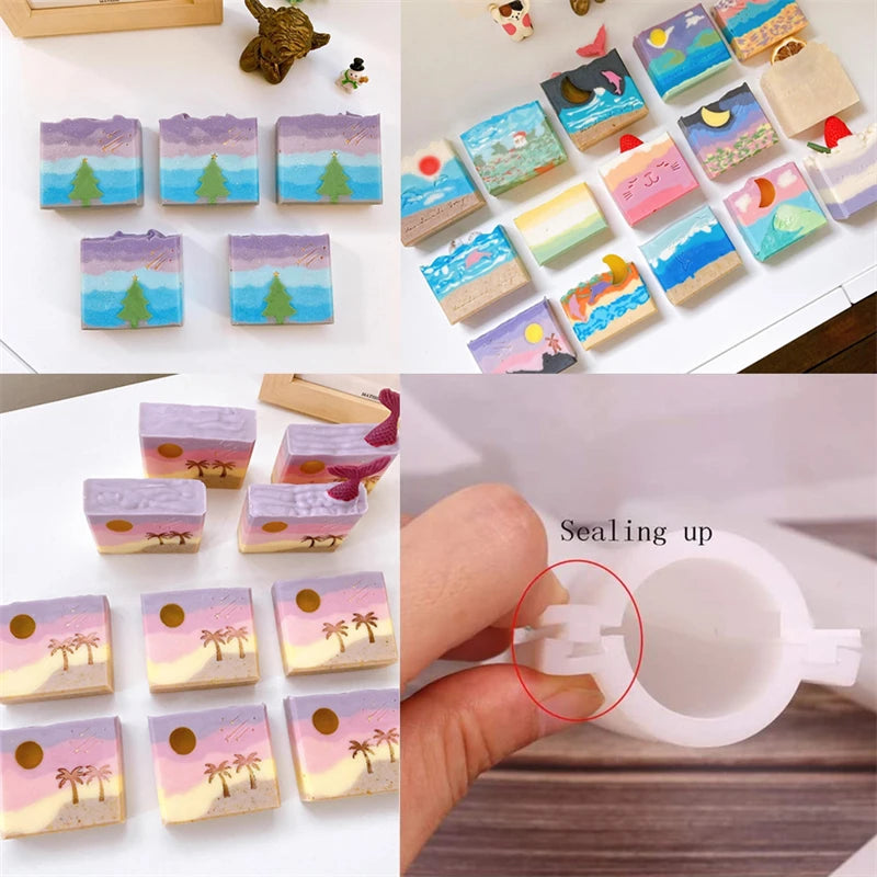 A collection of colorful silicone soap and candle molds in various shapes and colors arranged on a white surface.
