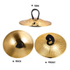 View of mini copper finger cymbals showing the side, back, and front views.