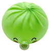 A bright lime green squishy toy shaped like a dumpling with closed eyes and a small protrusion.