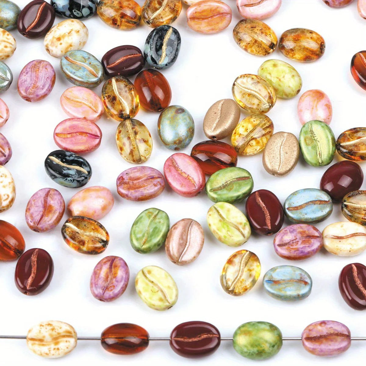 A collection of colorful, polished coffee bean beads in various shades and textures for jewelry making.