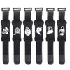 A set of black guitar string dampeners with adjustable tension.