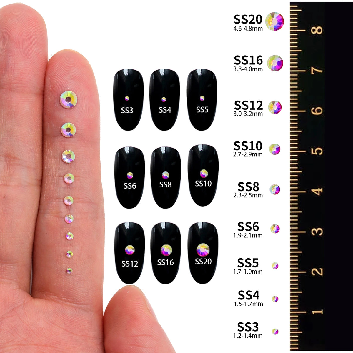 A collection of various size and colored glass crystal flatback rhinestones for nail art, displayed next to a ruler.