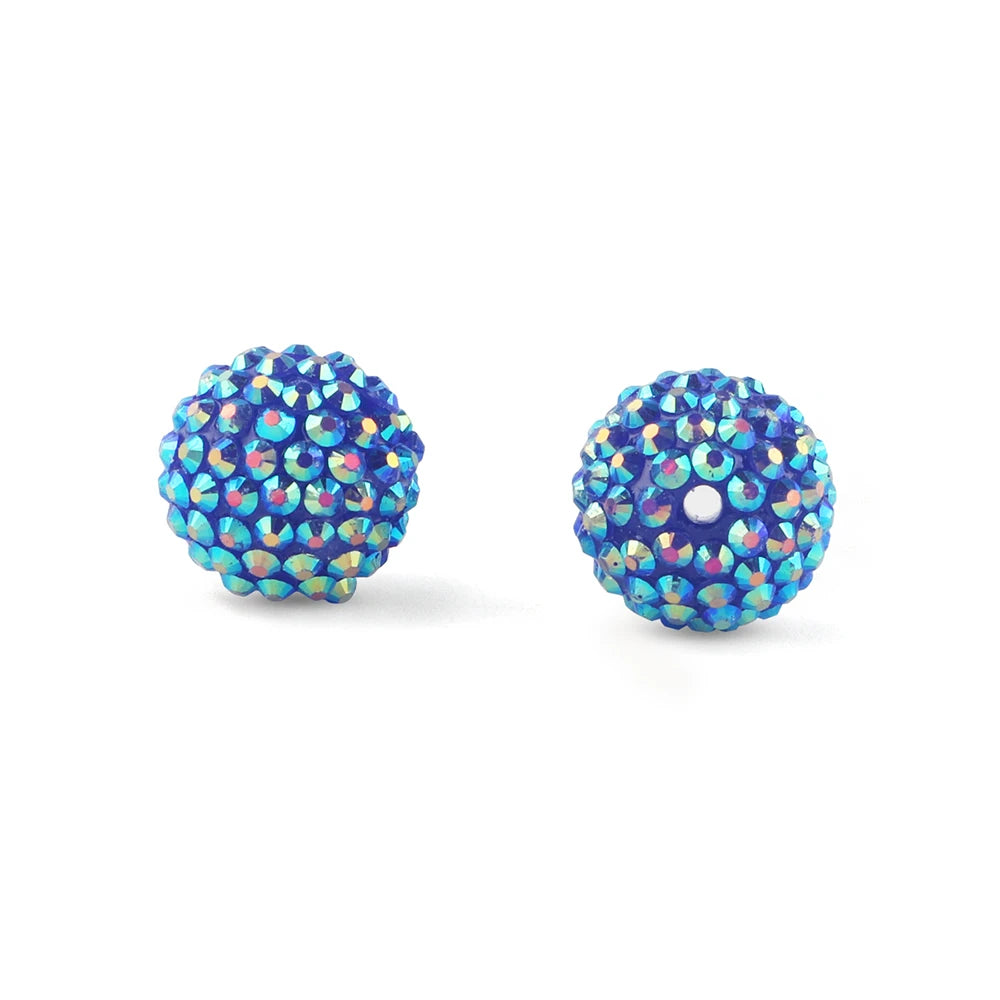 A spherical bead covered in iridescent blue and purple rhinestones for jewelry making