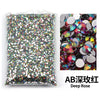 Bag of deep rose colored resin rhinestones for DIY craft and nail art