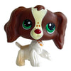 A brown and white Bobbing Deer bobblehead toy featuring large green glow eyes.