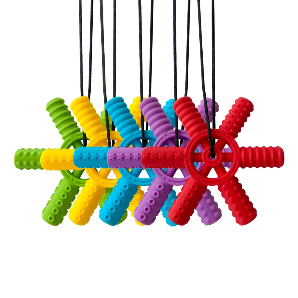 Colorful silicone steering wheel teether with multiple colored, textured silicone arms hanging from strings