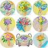 A set of floral diamond painting coasters featuring various flowers and bouquets in yellow, purple, and blue on a metal holde
