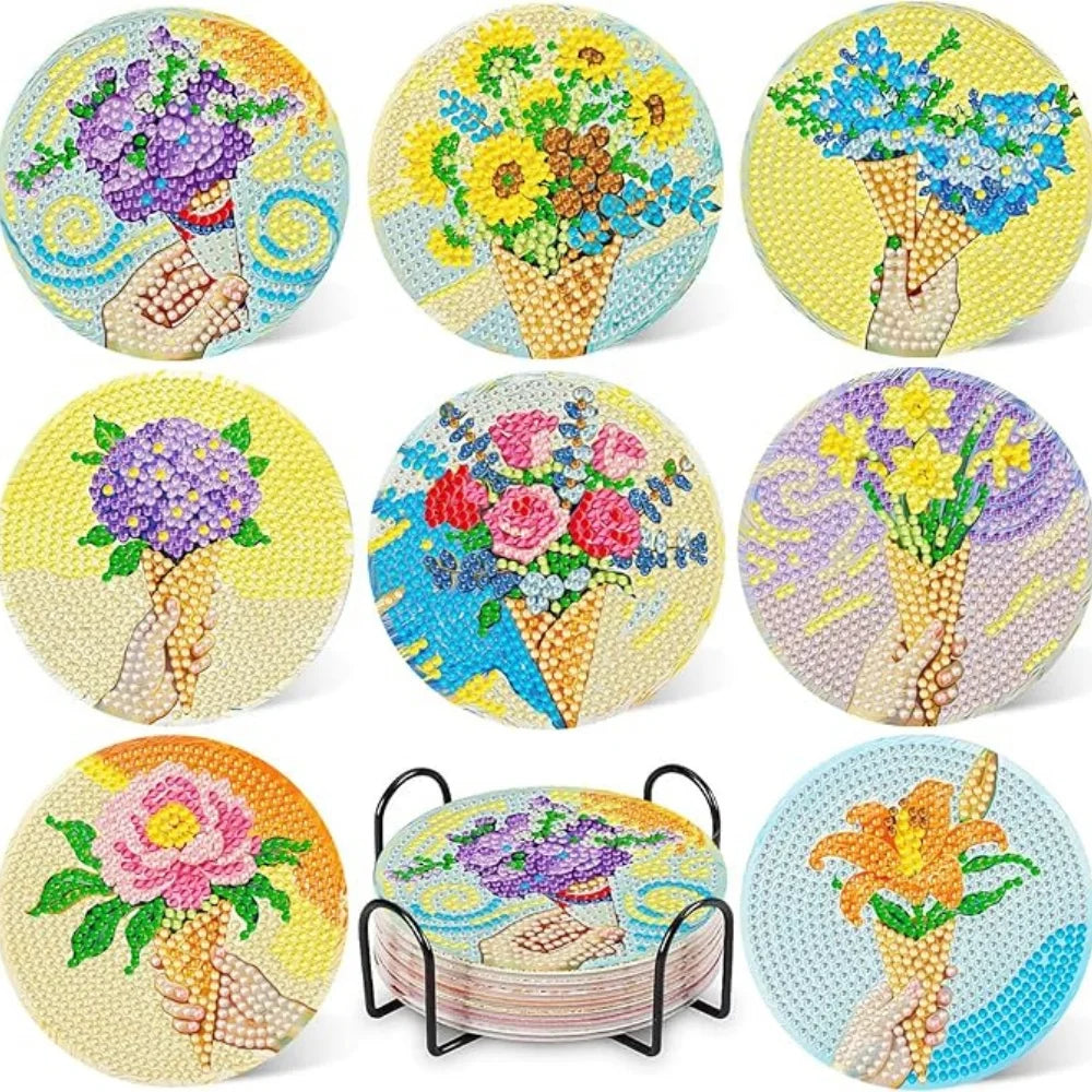 A set of floral diamond painting coasters featuring various flowers and bouquets in yellow, purple, and blue on a metal holde