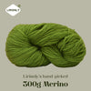 A ball of bright green Merino wool yarn labeled as Lirisnly's hand-picked 300g Merino.