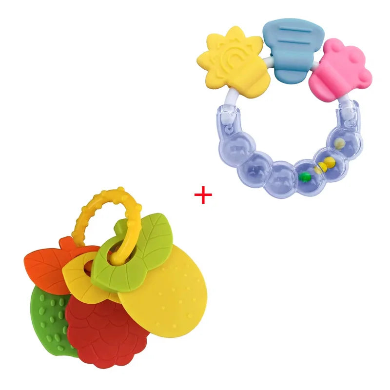 A set of colorful silicone baby teethers featuring fruit shapes and a blue silicone ring.
