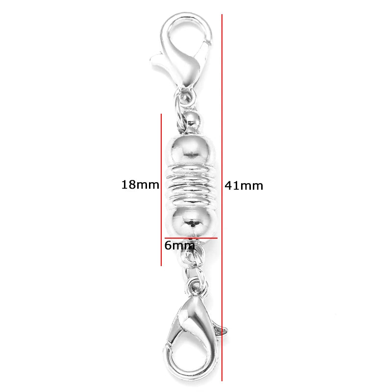 A silver magnetic lobster claw clasp for jewelry making with a jump ring and bail.