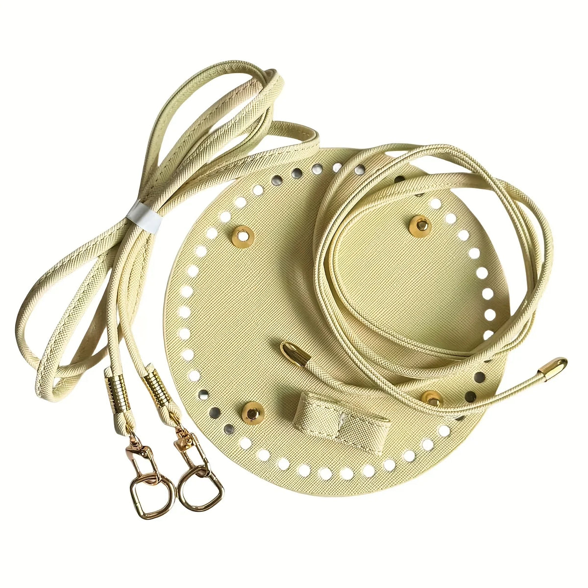 A light beige crochet dumpling bag hardware kit featuring a circular base and adjustable strap.