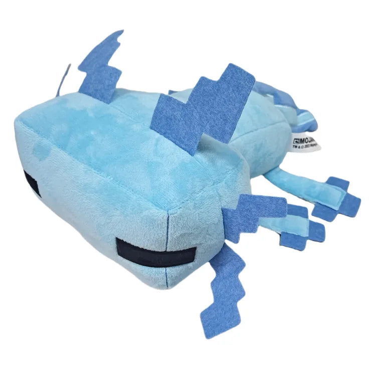 A light blue plush toy of an axolotl with spiky features and a black mouth, soft and cuddly.