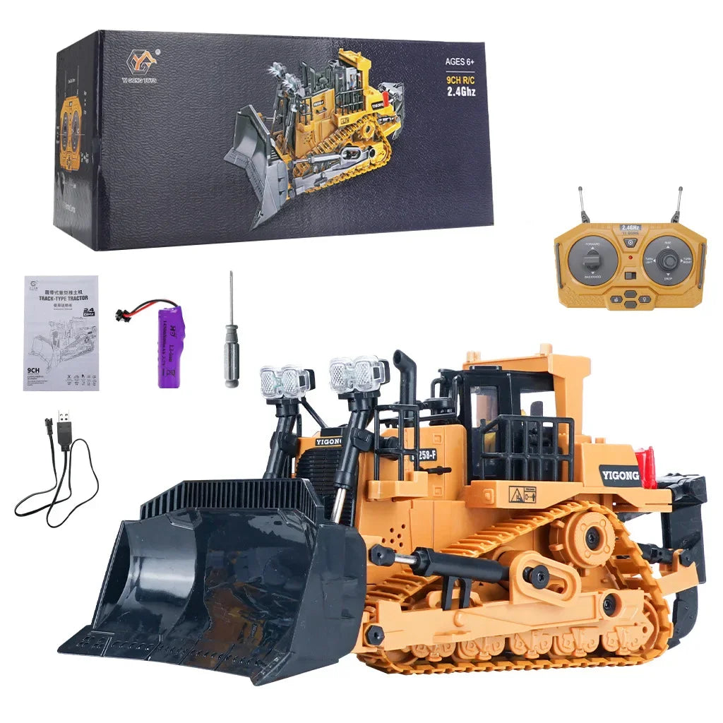 An orange remote control excavator toy with a black bucket and tracks, shown next to its packaging and controller.