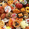 A collection of miniature food items including cakes, wine, and various snacks arranged in a display.