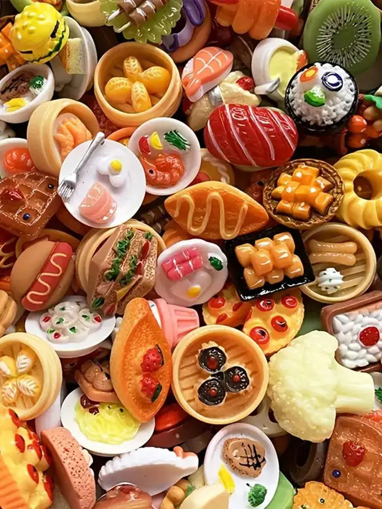 A collection of miniature food items including cakes, wine, and various snacks arranged in a display.