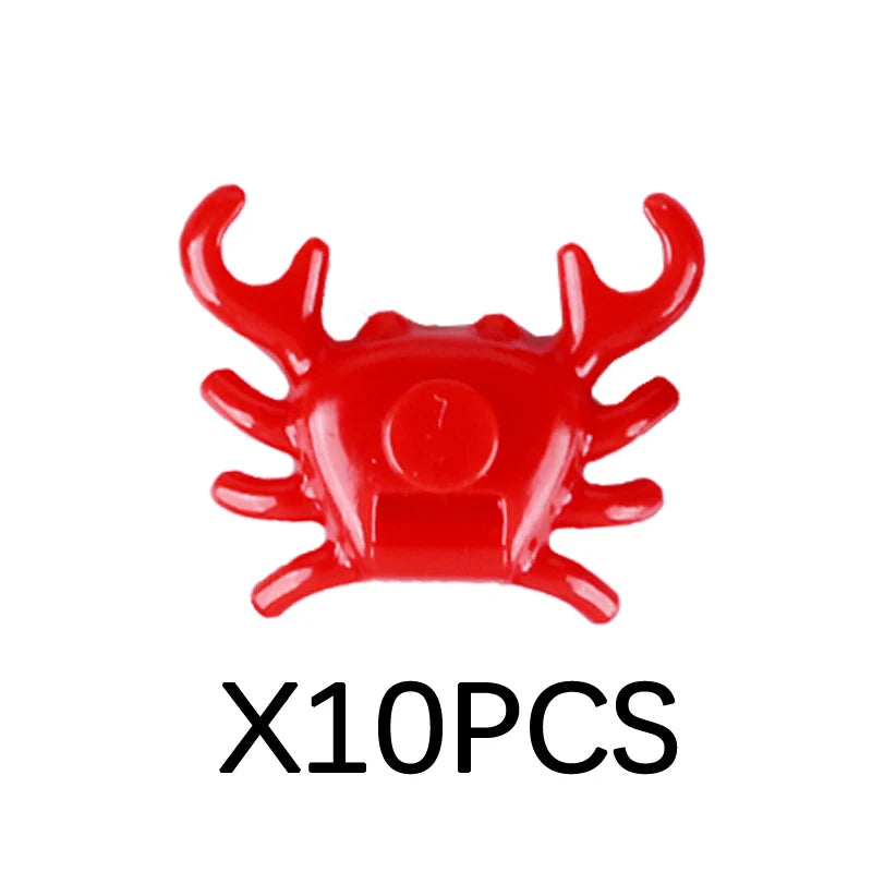 Red plastic marine animal building blocks set featuring a shark or similar creature shape