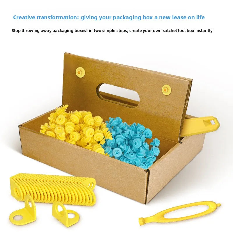 A cardboard box containing yellow and blue felt tool boxes and a yellow cutting tool.