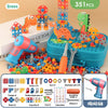 A set of dinosaur-themed drill and screw building toys featuring an electric drill, various tools, and building pieces.