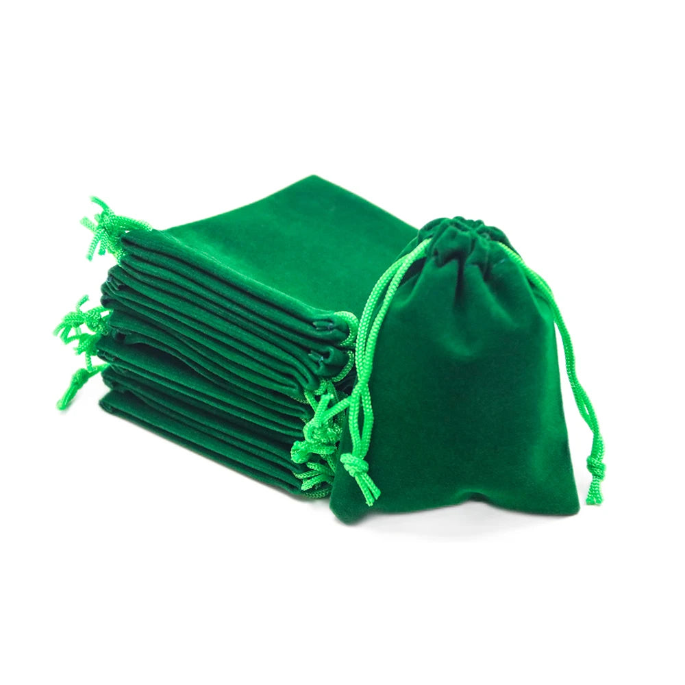 A dark green compact drawstring bag filled with stacked dice for tabletop games