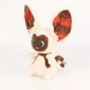 A plush doll of Momo or Appa from Avatar: The Last Airbender featuring brown and white fur with reddish-brown ear markings.