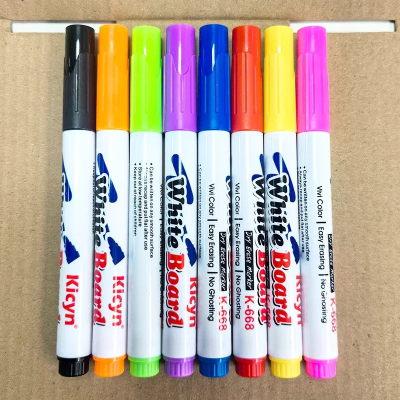 A set of colorful magical water painting pens in various colors arranged vertically on a cardboard background.