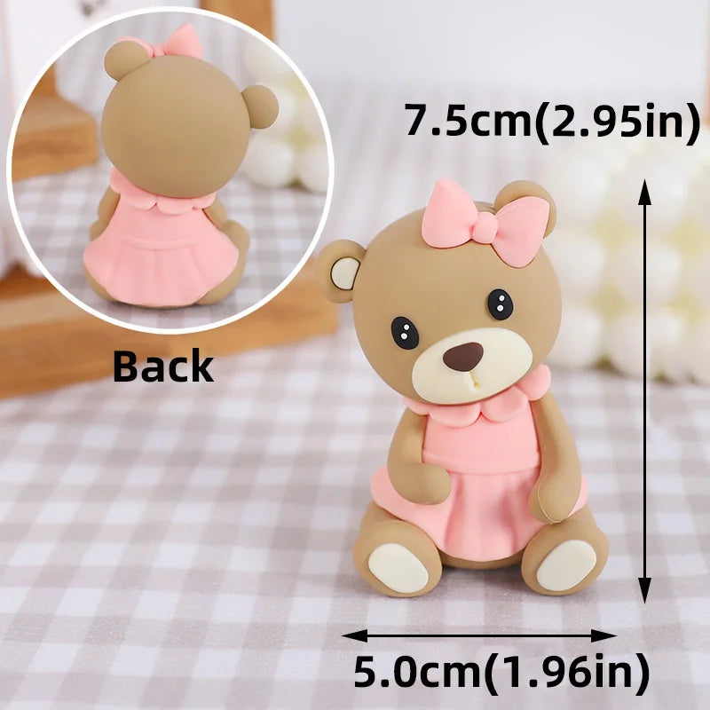 A light pink bear cake topper featuring a cute bear character with a bow, shown from the back and side views.