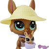 A brown animal figure with large eyes and a straw hat, holding a smaller, light-colored animal figure.