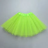 A bright lime green three-layer tutu skirt for girls displayed flat.